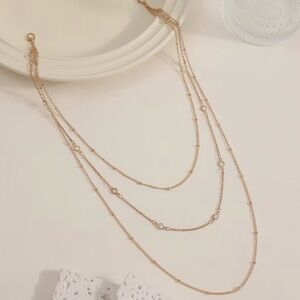 Elegant Multi-Layered body chain with satellite gems